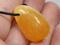 Preview: Orangencalcit mit Band oder Silber 925
