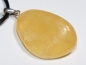 Preview: Orangencalcit mit Band oder Silber 925