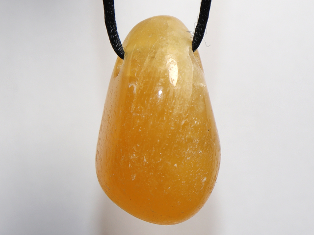 Orangencalcit mit Band oder Silber 925