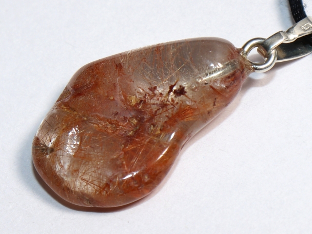 Rutilated quartz on cord