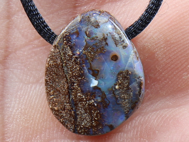 Boulder opal with cord