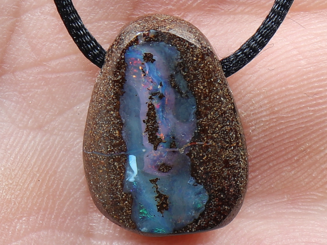 Boulder opal with cord