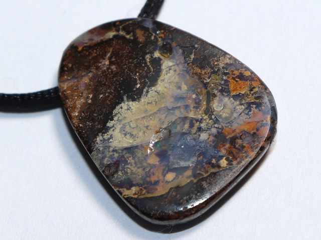 Boulder opal with cord