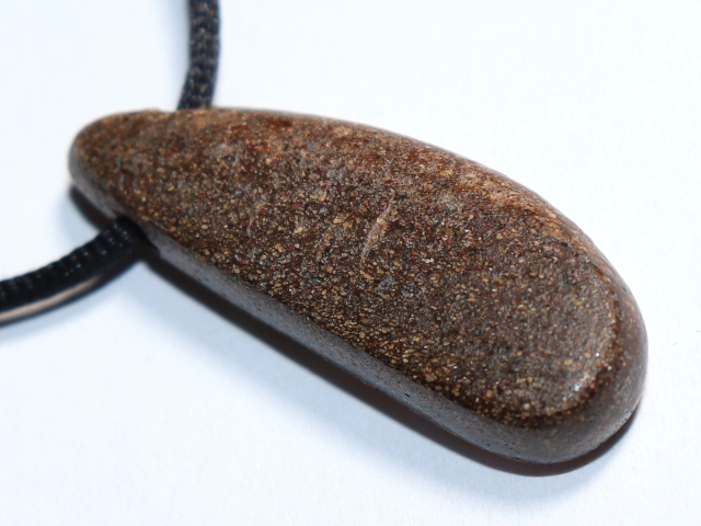 Boulder opal with cord