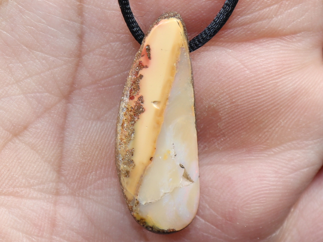Boulder opal with cord