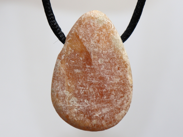 fire calcite with cord or silver 925