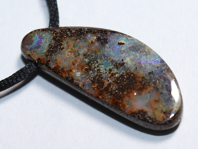 Boulder opal with cord