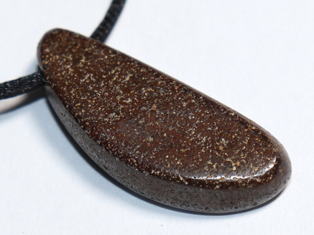 Boulder opal with cord