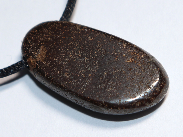 Boulder opal with cord