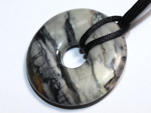 Picassojaspis mit Band