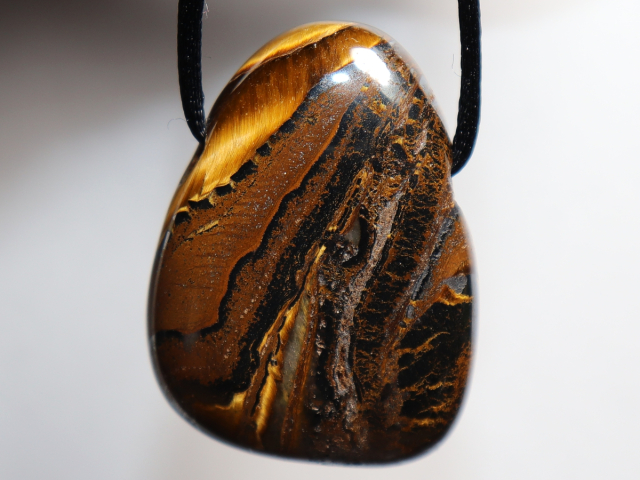 tiger iron with cord or silver 925