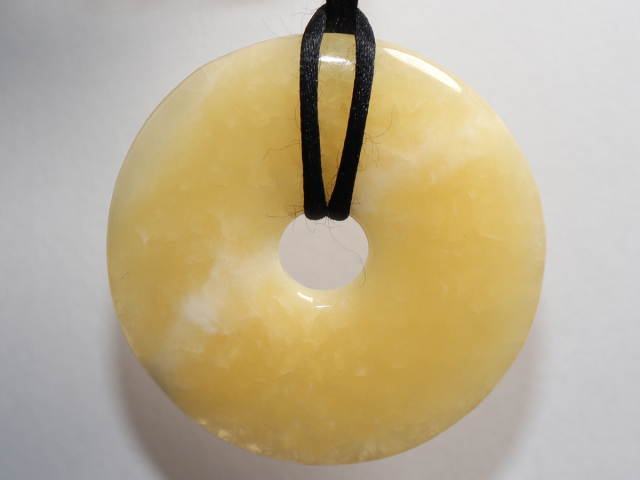 Preview: Orangencalcit mit Band