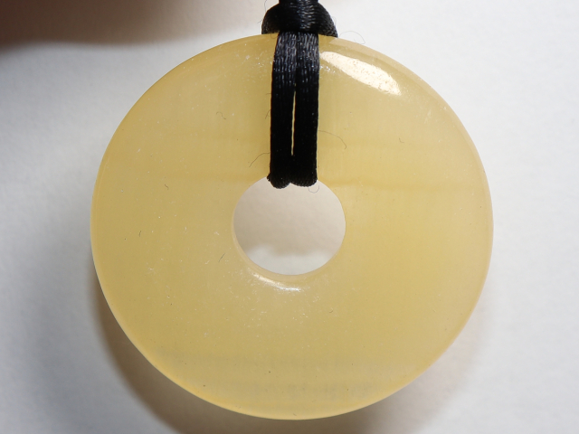 Preview: orange calcite with cord