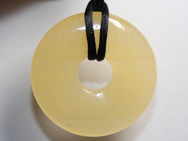 Preview: orange calcite with cord
