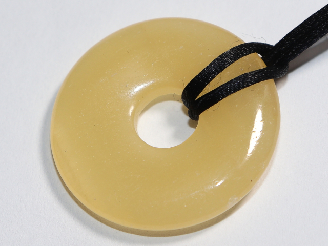 orange calcite with cord