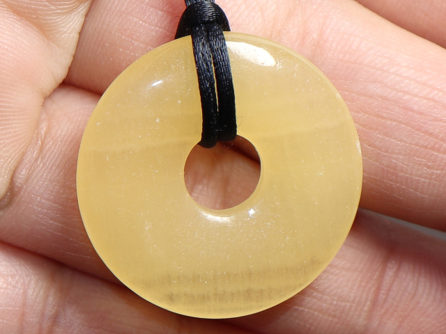 orange calcite with cord