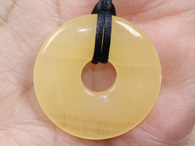 orange calcite with cord