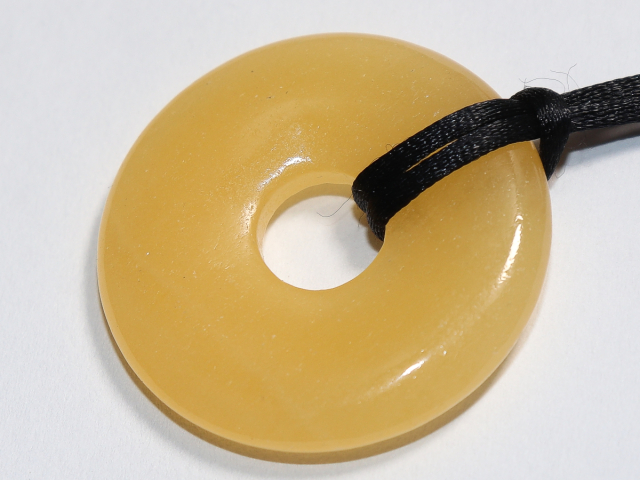 orange calcite with cord