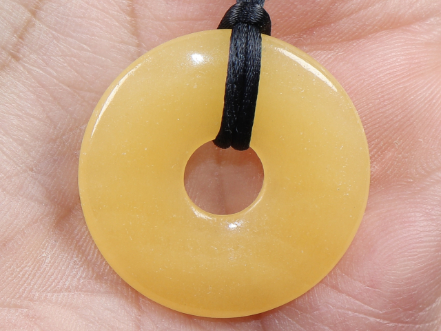 orange calcite with cord