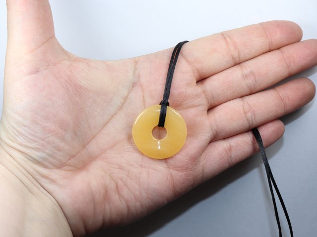 orange calcite with cord