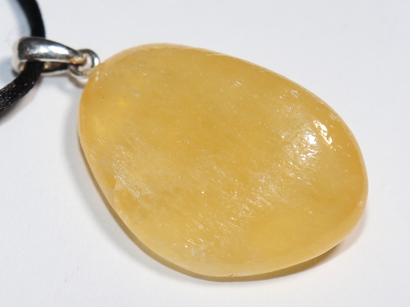 Orangencalcit mit Band oder Silber 925