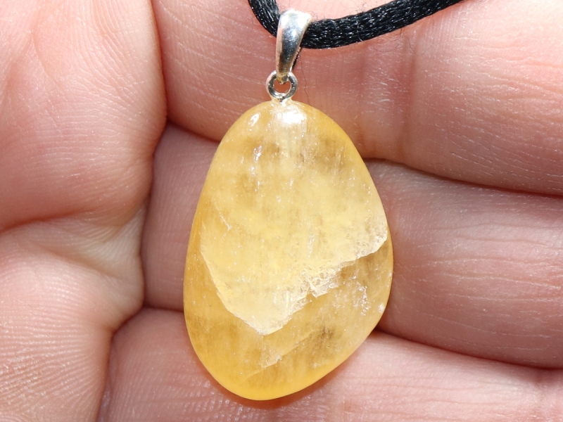 Orangencalcit mit Band oder Silber 925