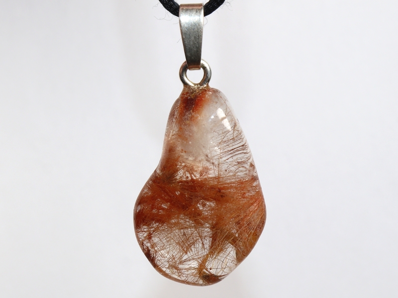 Rutilated quartz on cord