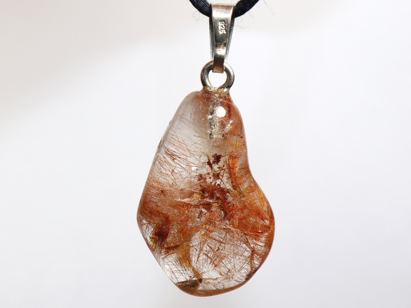 Rutilated quartz on cord