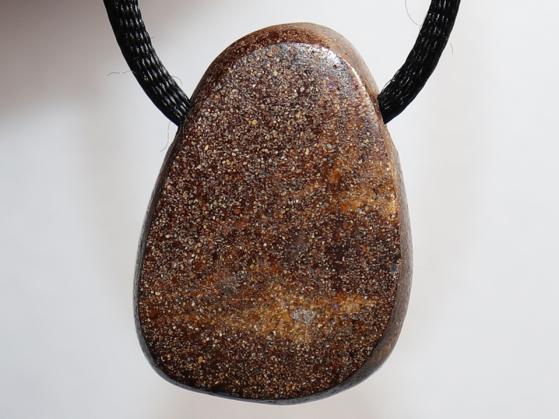 Boulder opal with cord