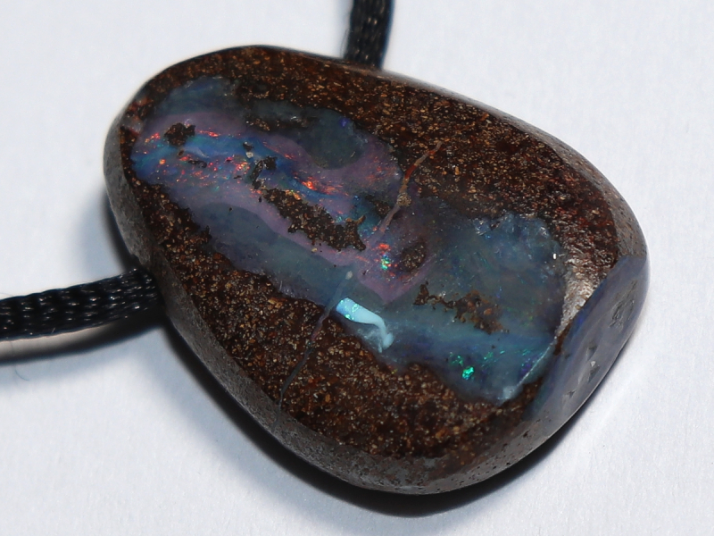 Boulder opal with cord