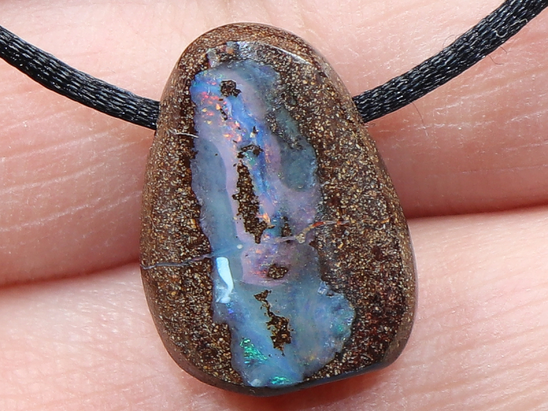 Boulder opal with cord