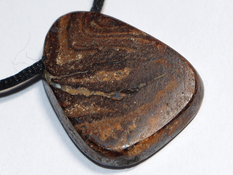 Boulder opal with cord