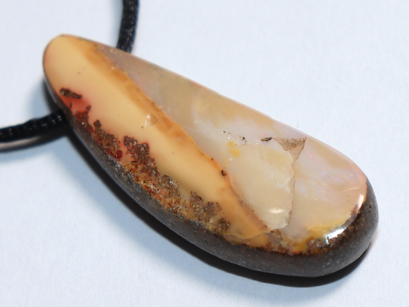 Boulder opal with cord