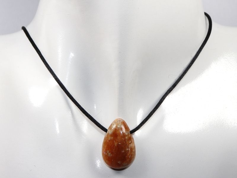 fire calcite with cord or silver 925
