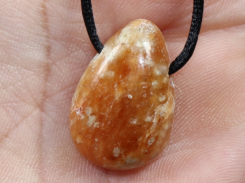 fire calcite with cord or silver 925