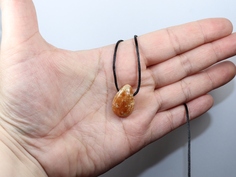 fire calcite with cord or silver 925