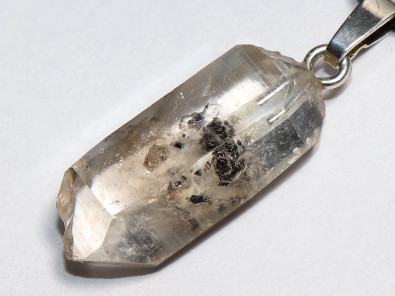 rock crystal with bitumen with cord or silver 925