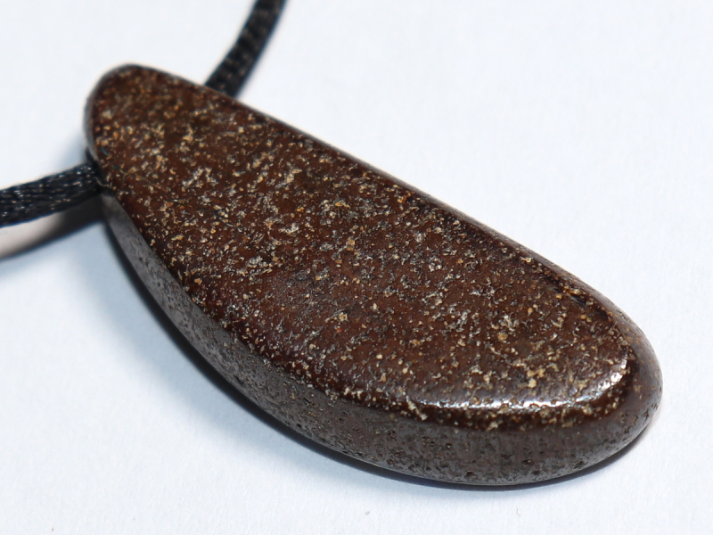 Boulder opal with cord