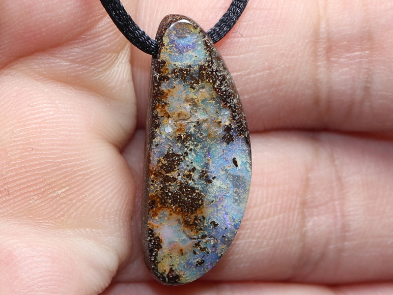 Boulder opal with cord