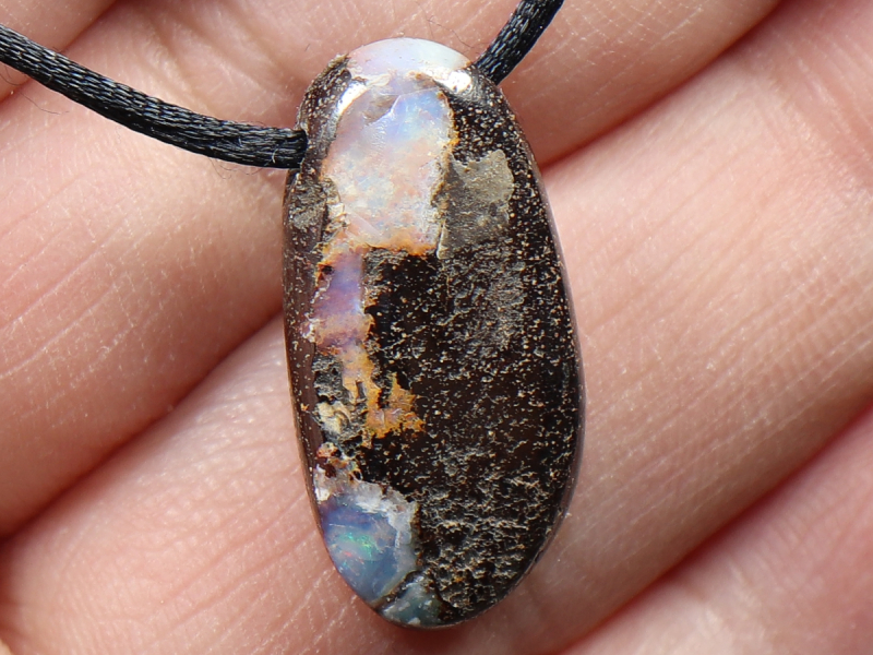 Boulder opal with cord