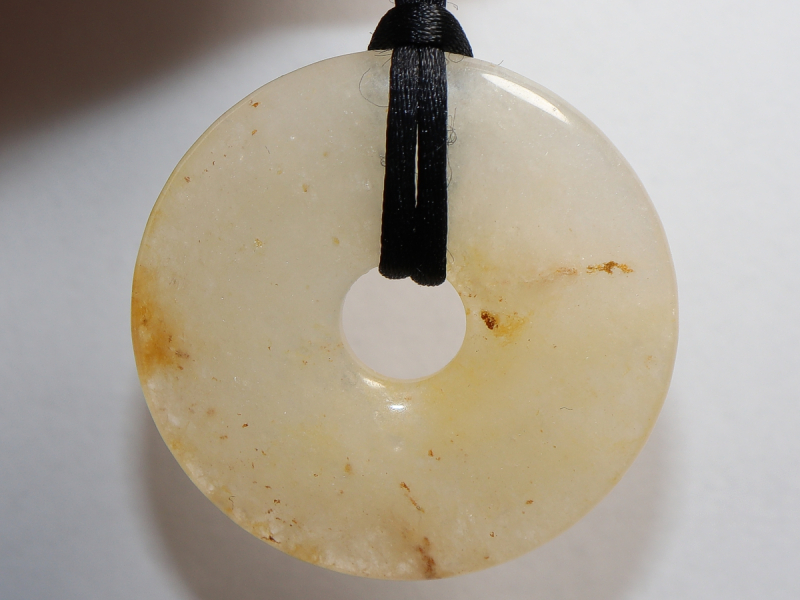 orange calcite with cord