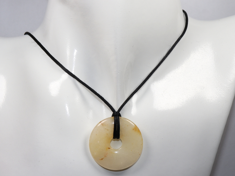 orange calcite with cord