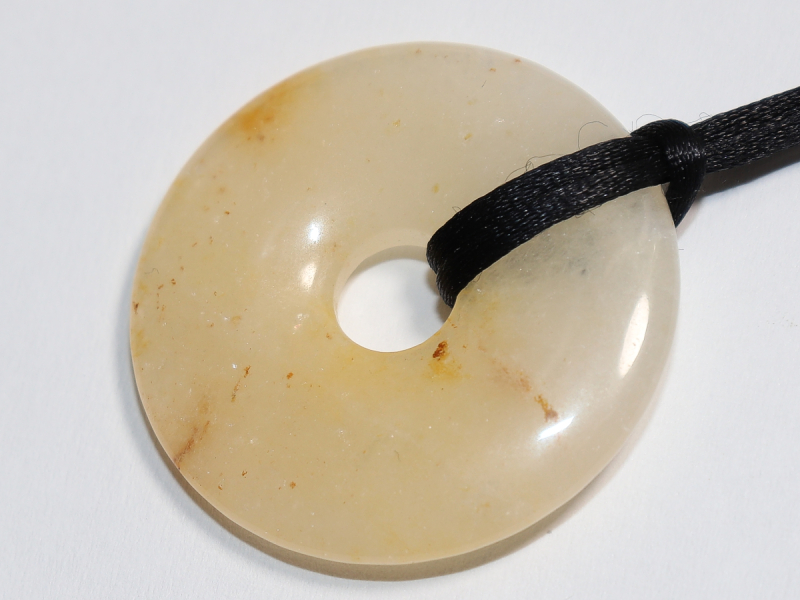 orange calcite with cord