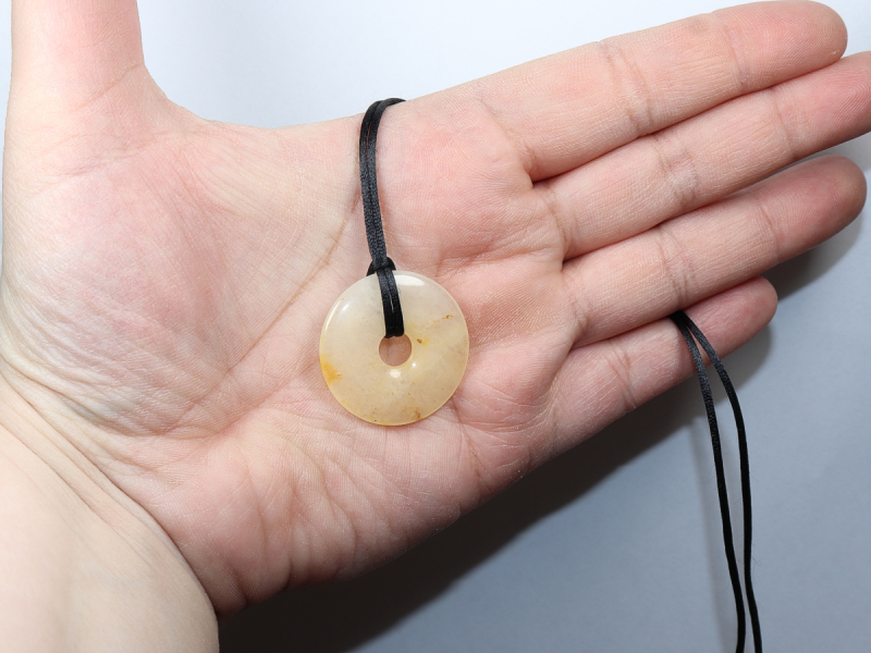 orange calcite with cord