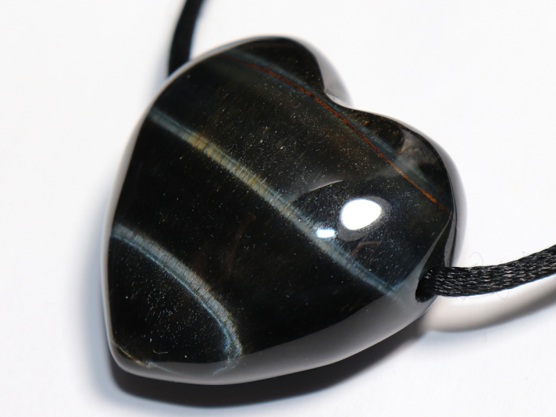 hawks eye with cord or silver 925