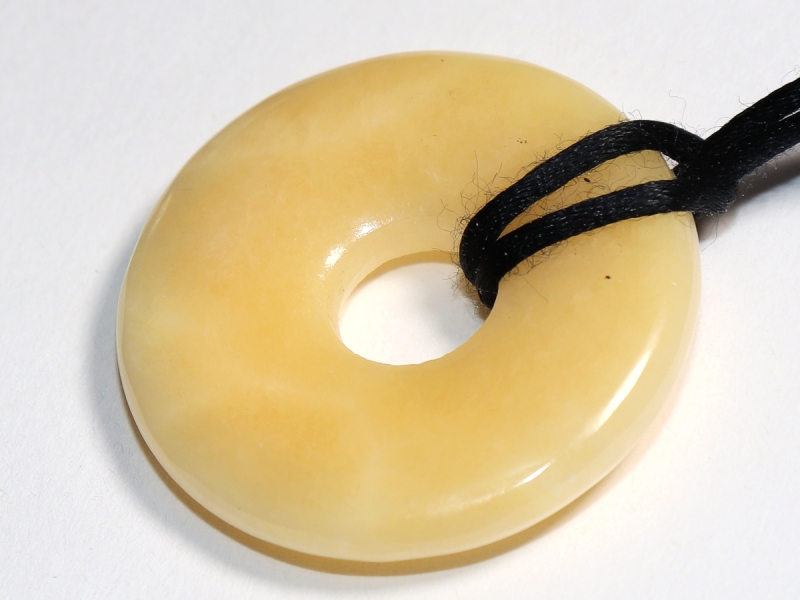 orange calcite with cord