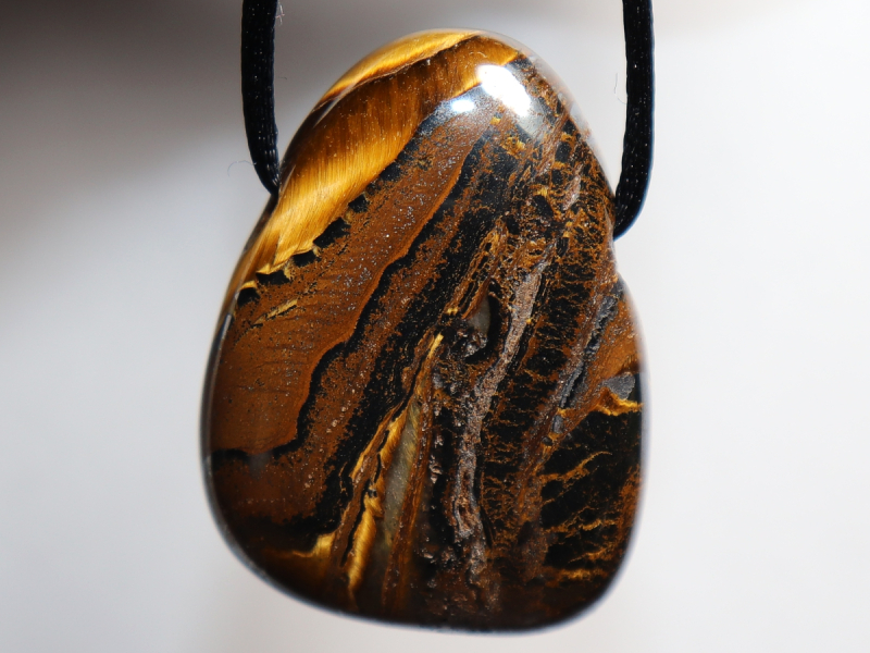 tiger iron with cord or silver 925