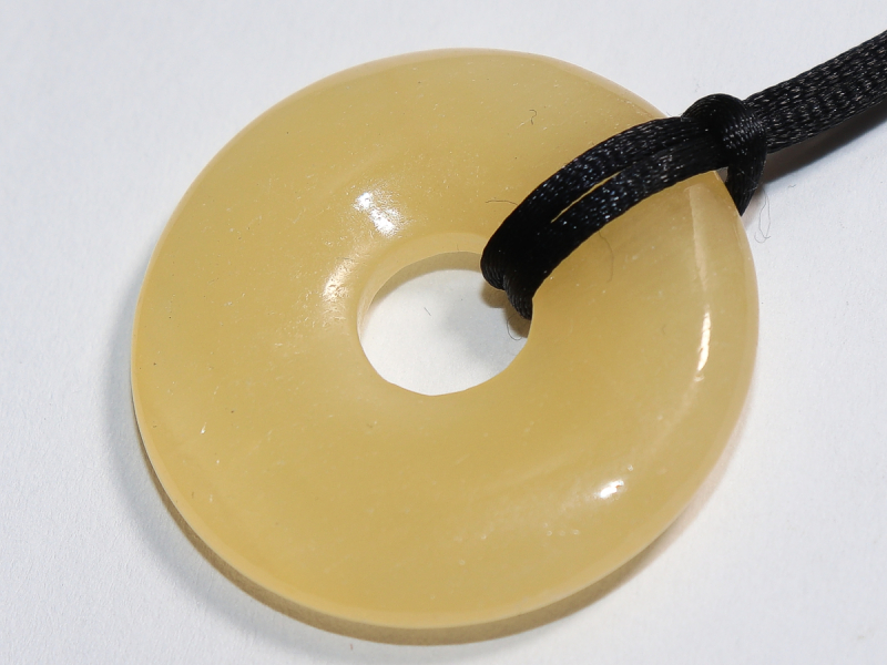 orange calcite with cord