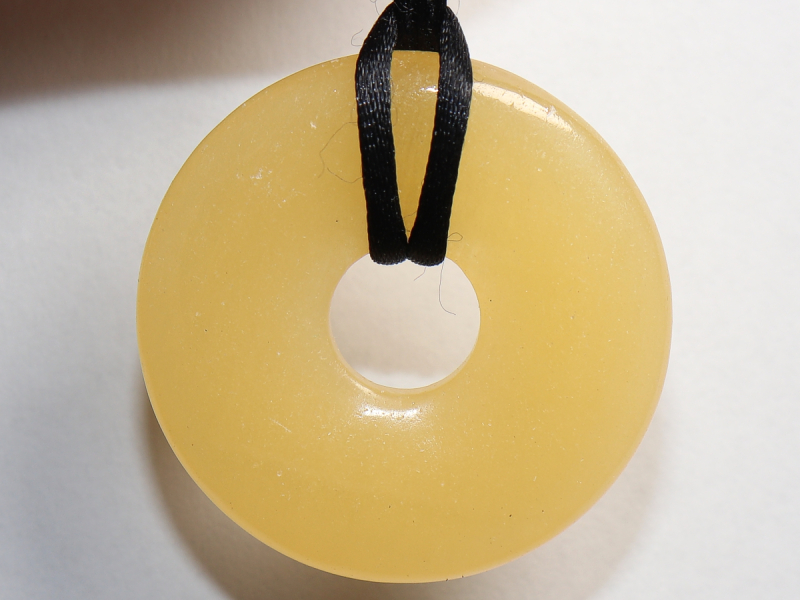 orange calcite with cord
