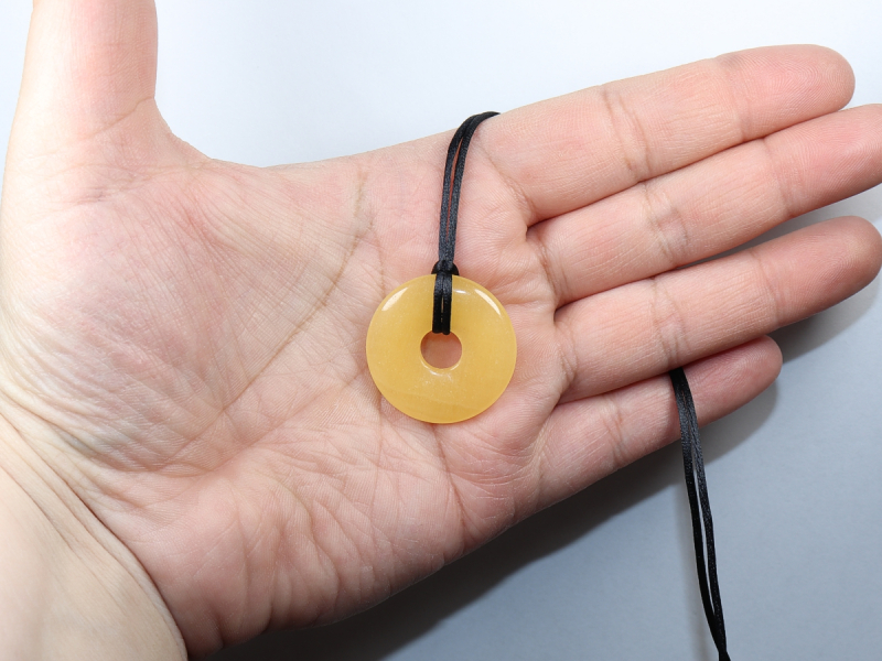 orange calcite with cord
